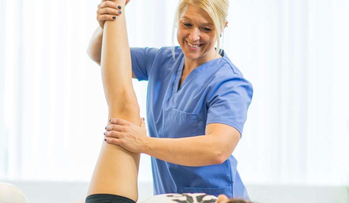 a woman is doing a direct access to physical therapy at Capstone Physical Therapy and Fitness
